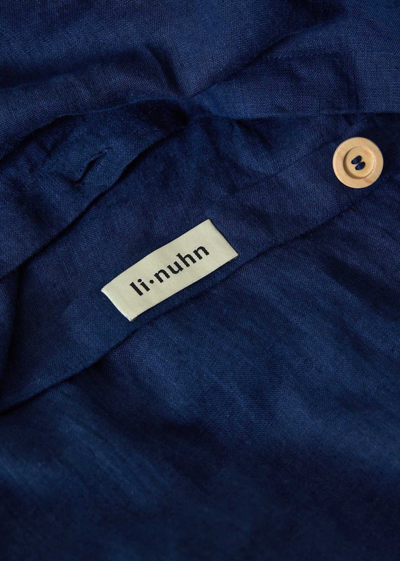 Linuhn linen bedding sheets in Baltic navy blue natural fabric organic and ethically made